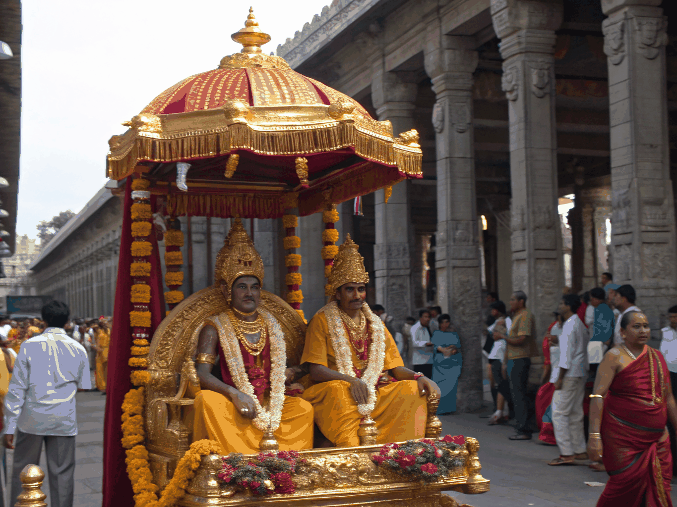 Grand temple procession with decorated deity